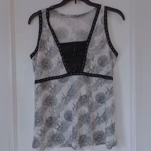 Black and white silky feel sleeveless shell blouse